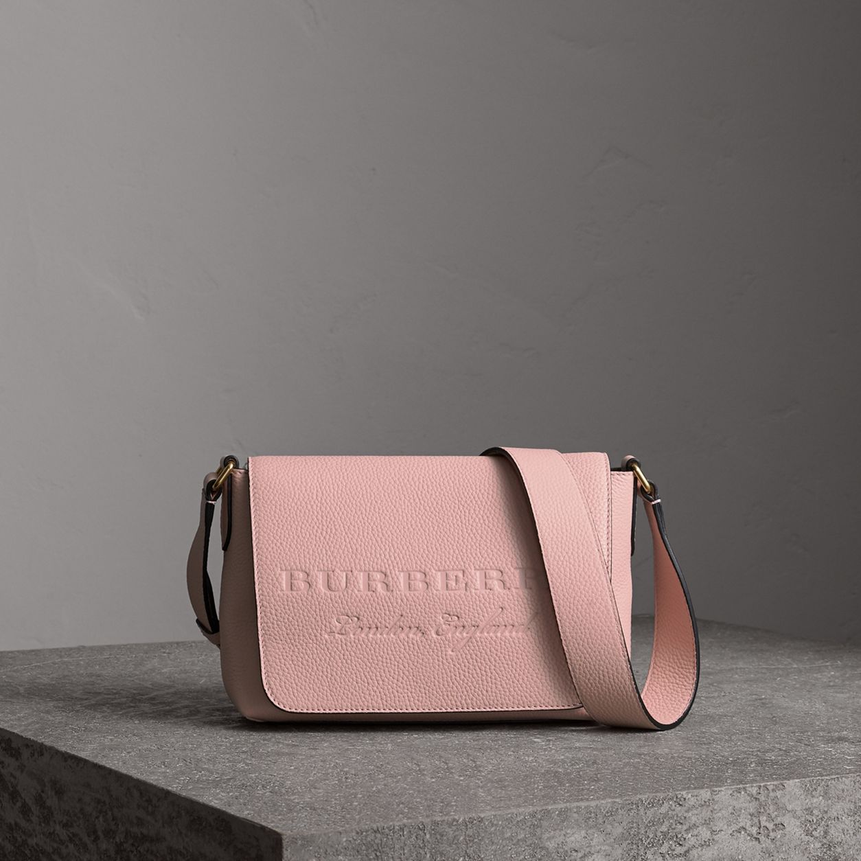 Burberry's small embossed leather messenger bag