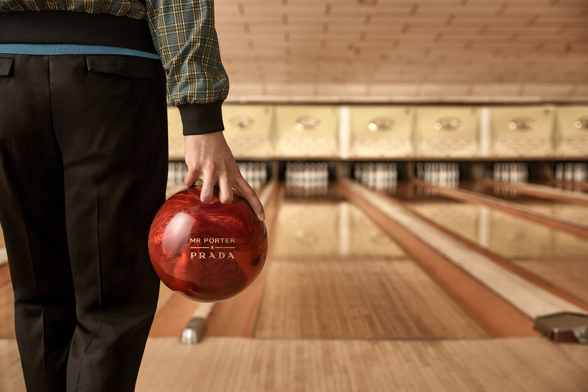 Prada and Mr Porter team up for a kitschy bowling-inspired collection