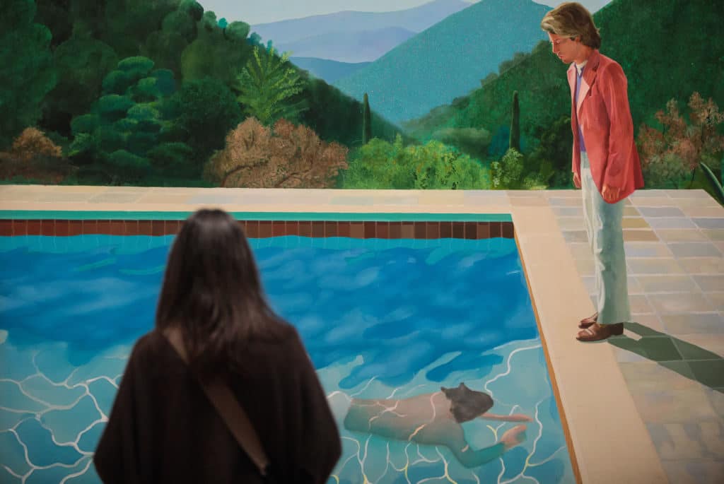 The tale of David Hockney & his record-shattering ‘Portrait of an Artist’