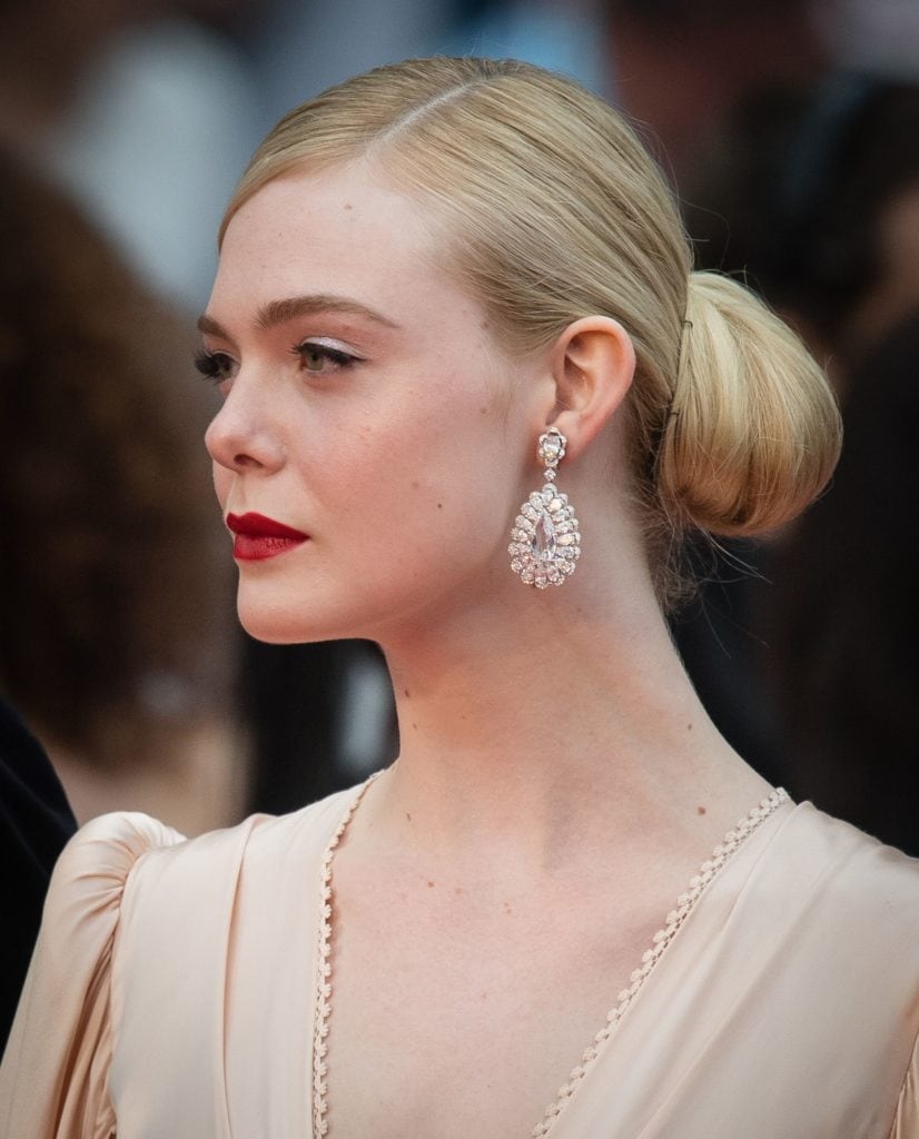 Elle Fanning in Chopard earrings. Image Courtesy Getty