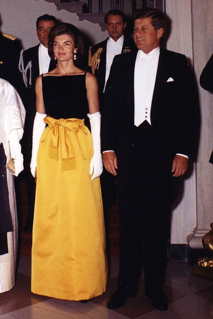 Jacqueline Kennedy in her famed marigold ball skirt at a state dinner in White House