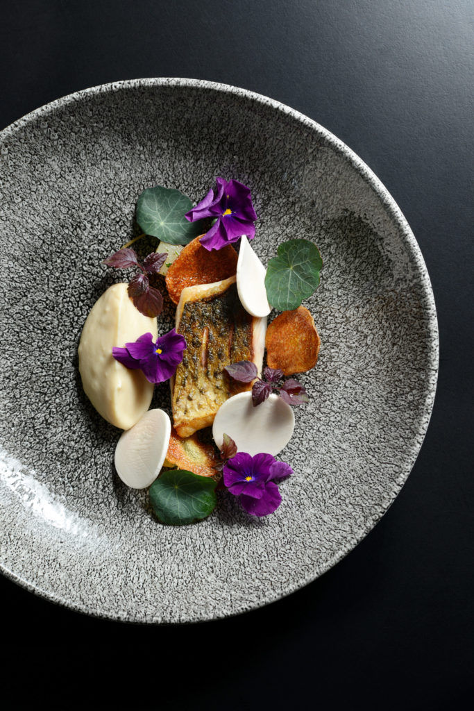 Fish (stripped bass here) and mushrooms are two important components of Pierre Sang's cuisine - Photography by Nicolas Villion