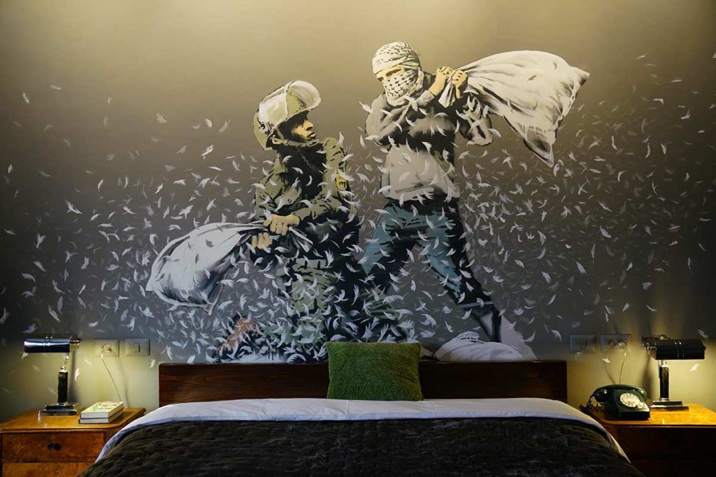 A mural in Walled Off Hotel in Bethlehem. (Image: The Walled Off Hotel)