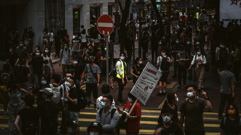 Hong Kong rolls out vaccine passport, tightens COVID-19 measures