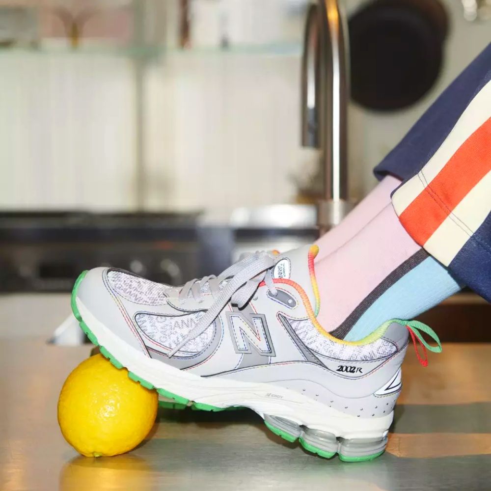 ganni x new balance sneakers stepping on a lemon