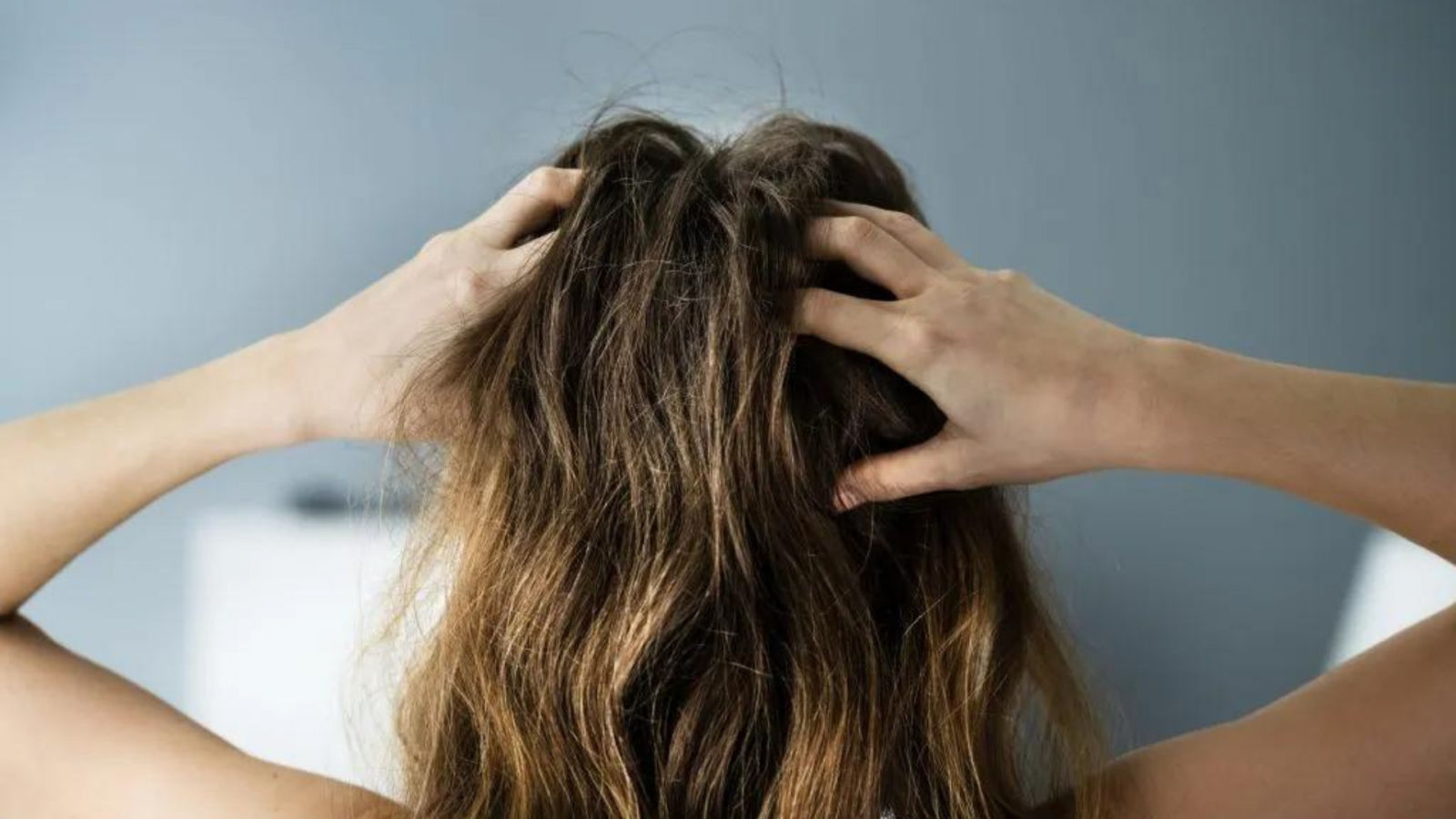 The causes of hair loss at the crown — plus, what to do about it, according to experts