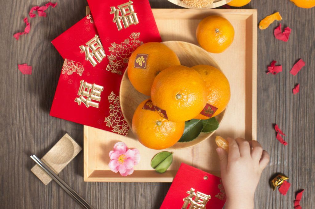 The origins of Chap Goh Meh and how throwing oranges became a part of the tradition
