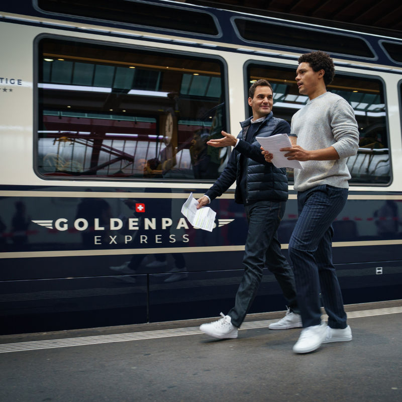 Take the grand train tour of Switzerland with Roger Federer and Trevor Noah