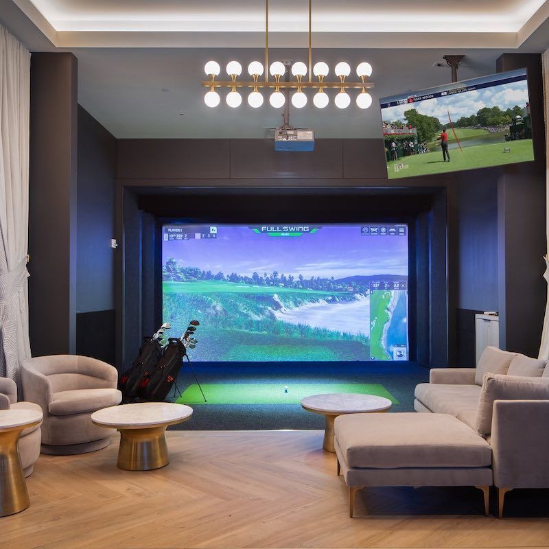 Tiger Woods and Justin Timberlake have opened an NYC sports bar with golf simulators