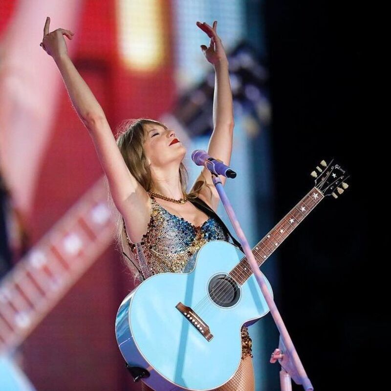 Taylor Swift and her custom guitar and piano collection, as seen on the ‘Eras’ tour