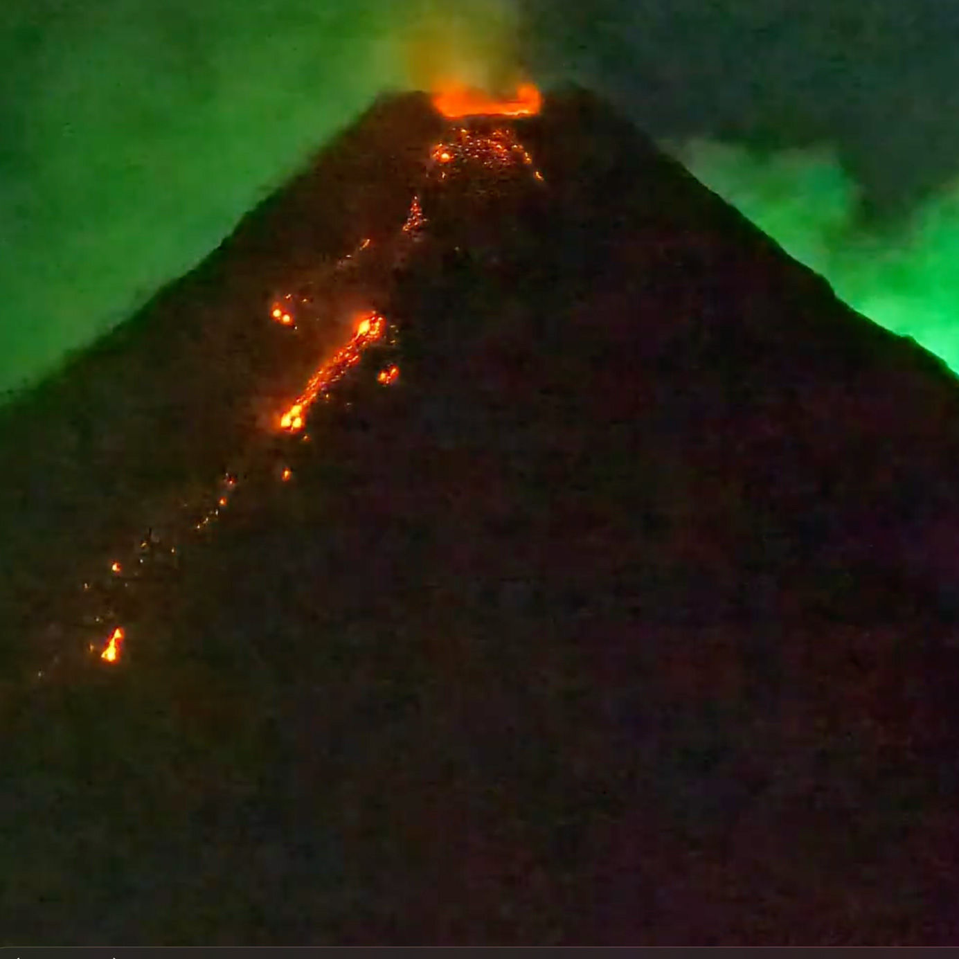 Footage of a meteor streaking behind erupting Mayon Volcano goes viral