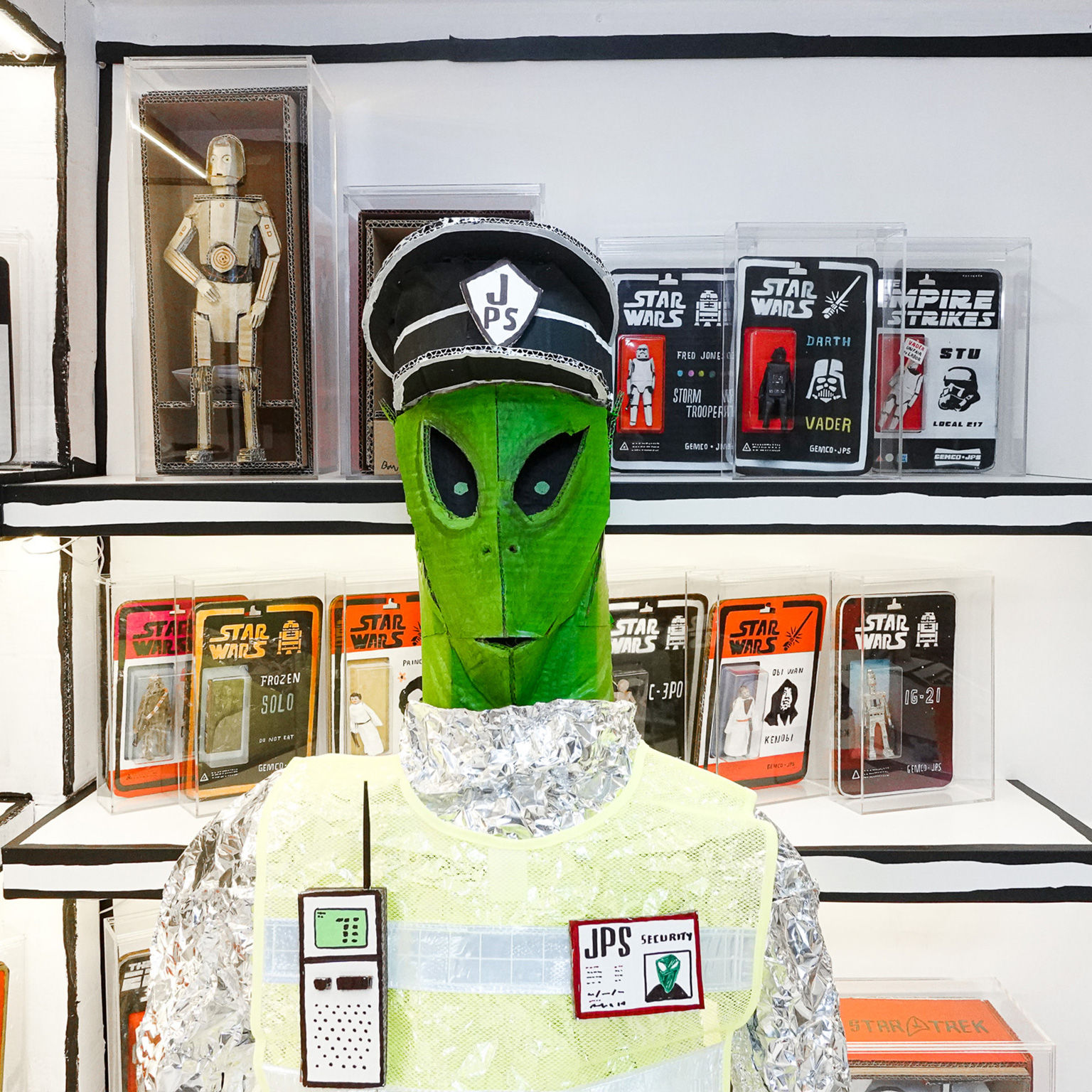 Barminski transforms JPS Gallery into a cardboard alien airport terminal