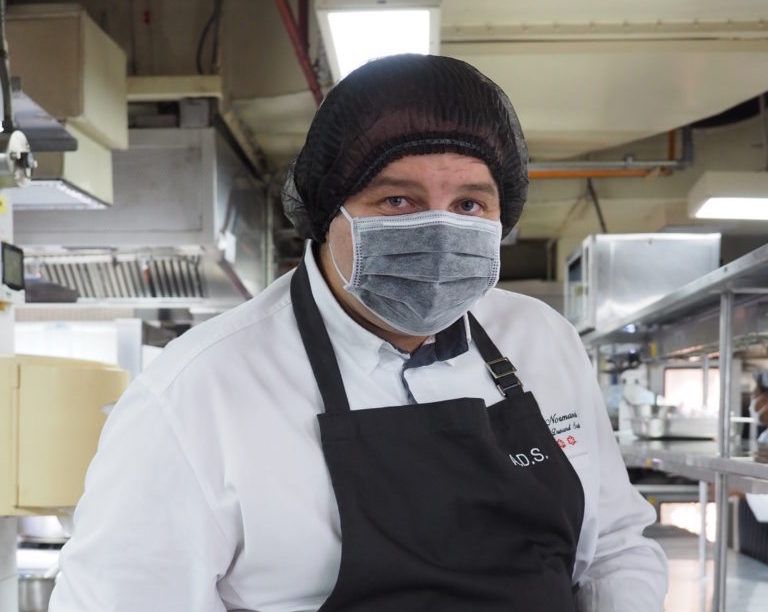 Celebrated chefs from the Mandarin Oriental Bangkok prep meals for frontline medical staff
