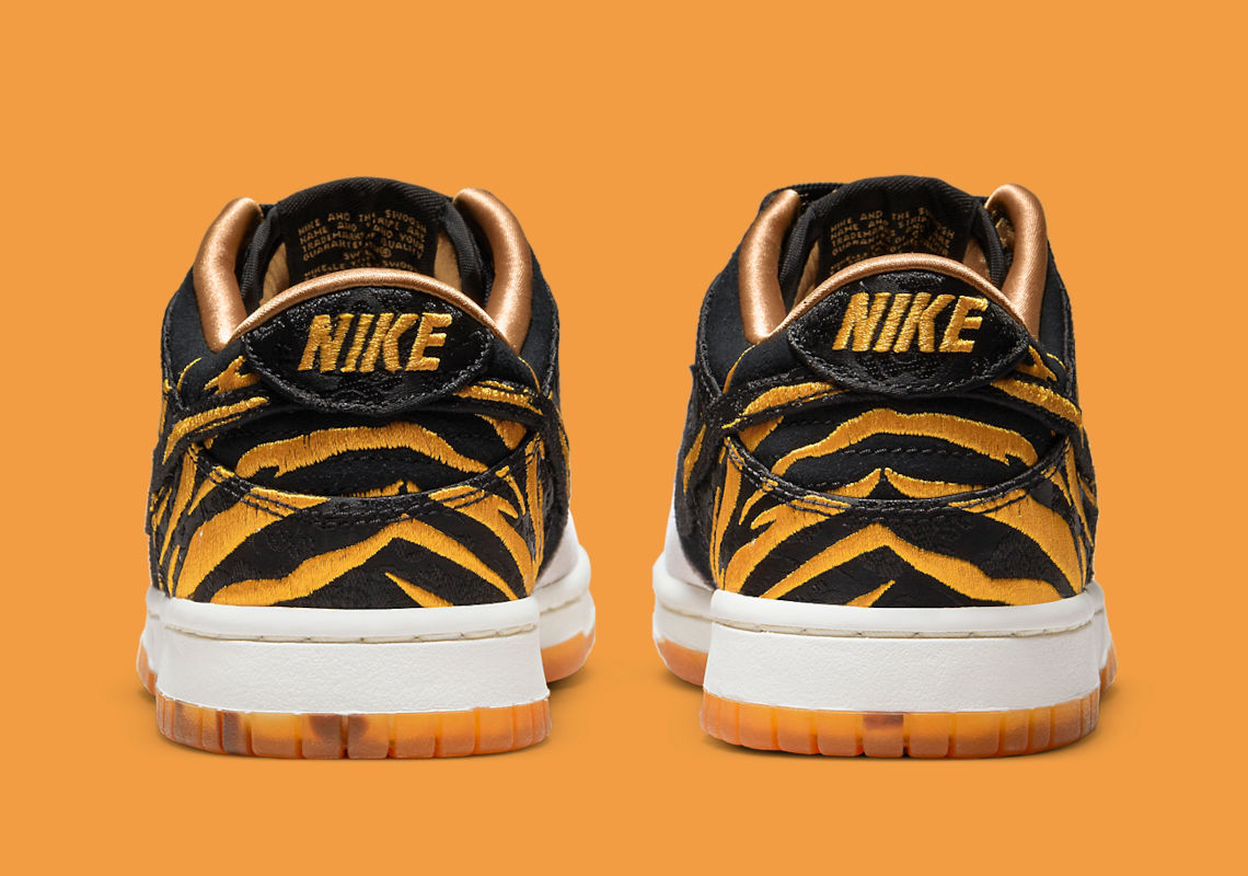 ASOS DESIGN Dakota chunky hi top sneakers in bright tiger print | ASOS