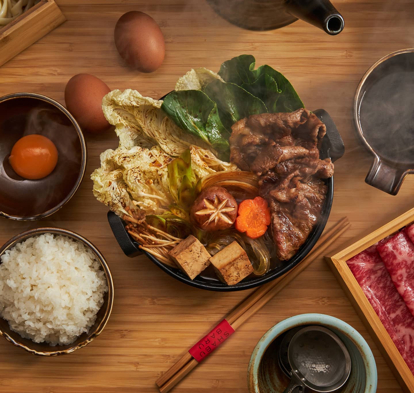 Split pot-one side for Sukiyaki and the other for Shabu Shabu