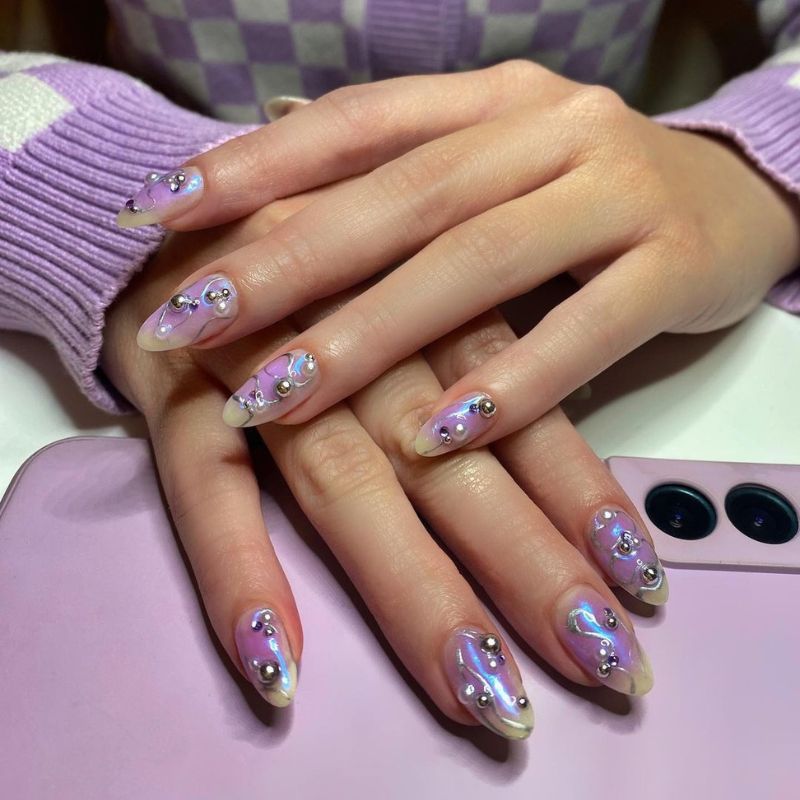 Nail jewellery is the blingy manicure trend taking over