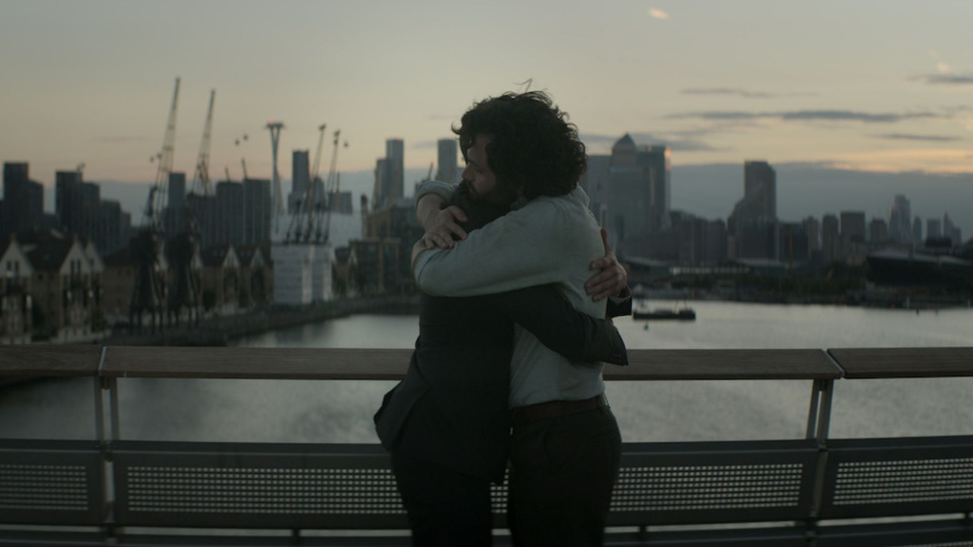 Joe and Rhys hugging on the bridge