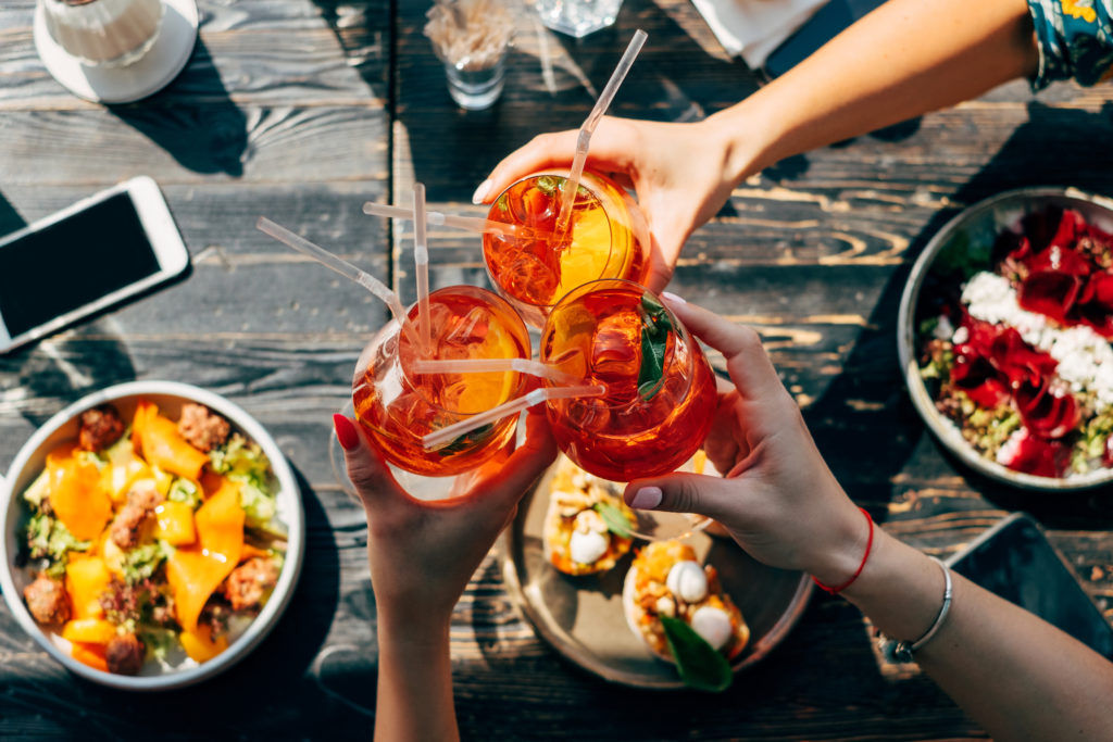 Does drinking alcohol interfere with weight loss? Here’s what experts say