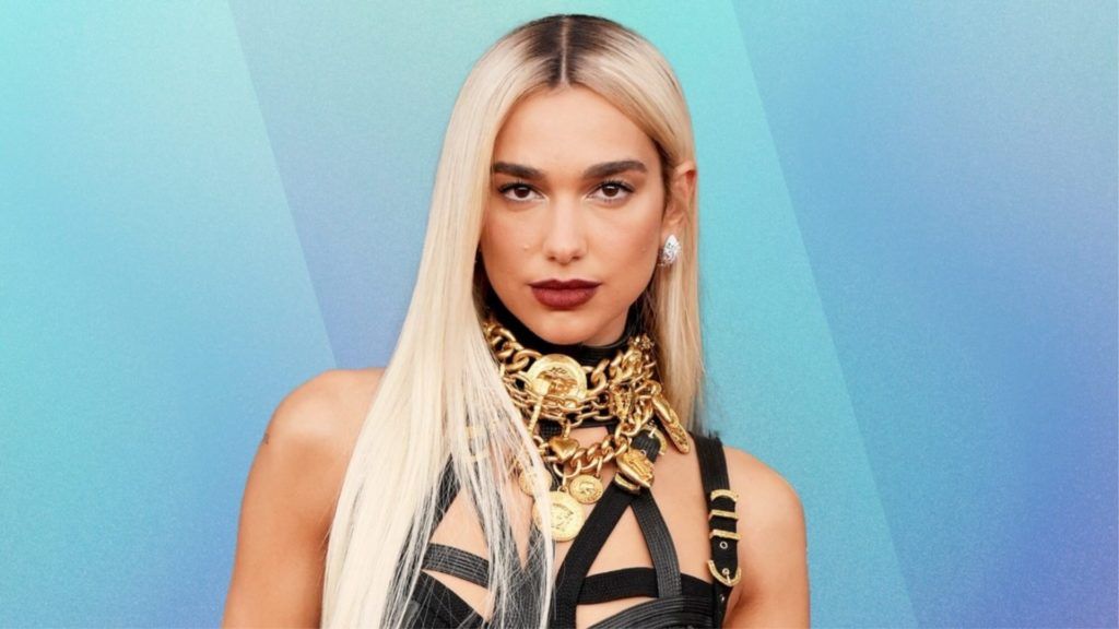 Watch Dua Lipa nail a headstand yoga pose with ease