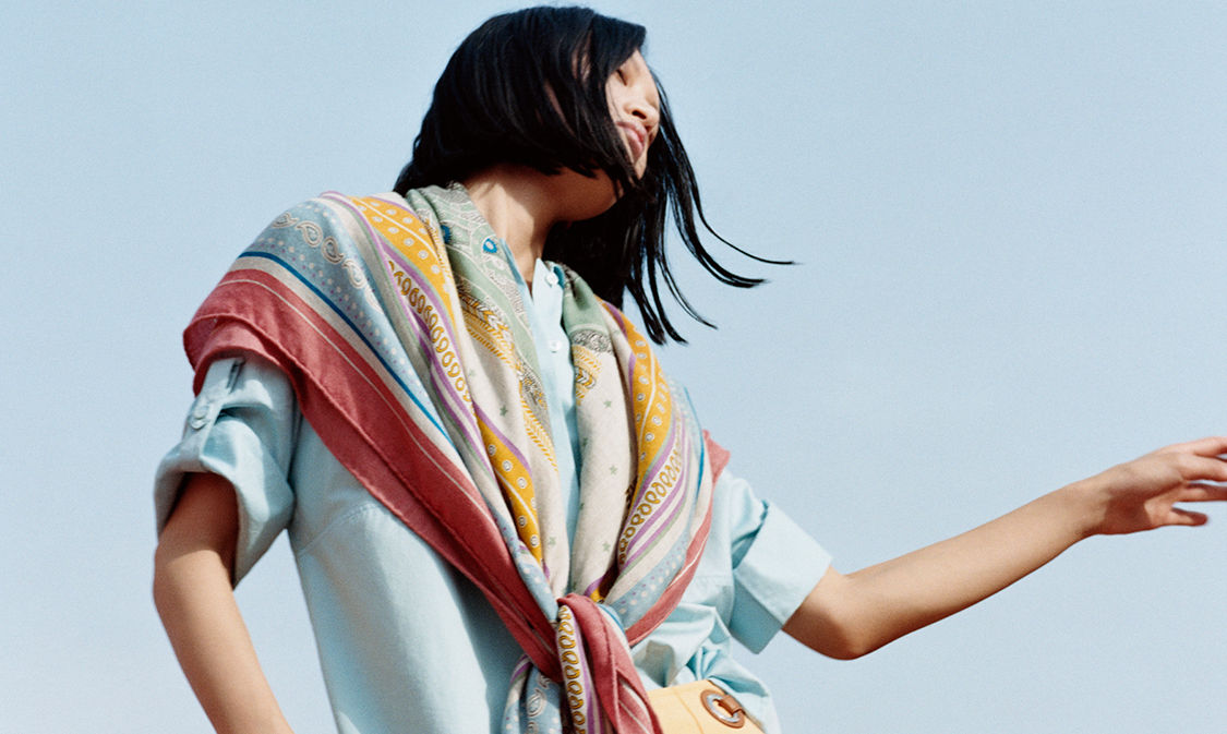 Discover the timeless elegance and versatility of the Hermès scarf