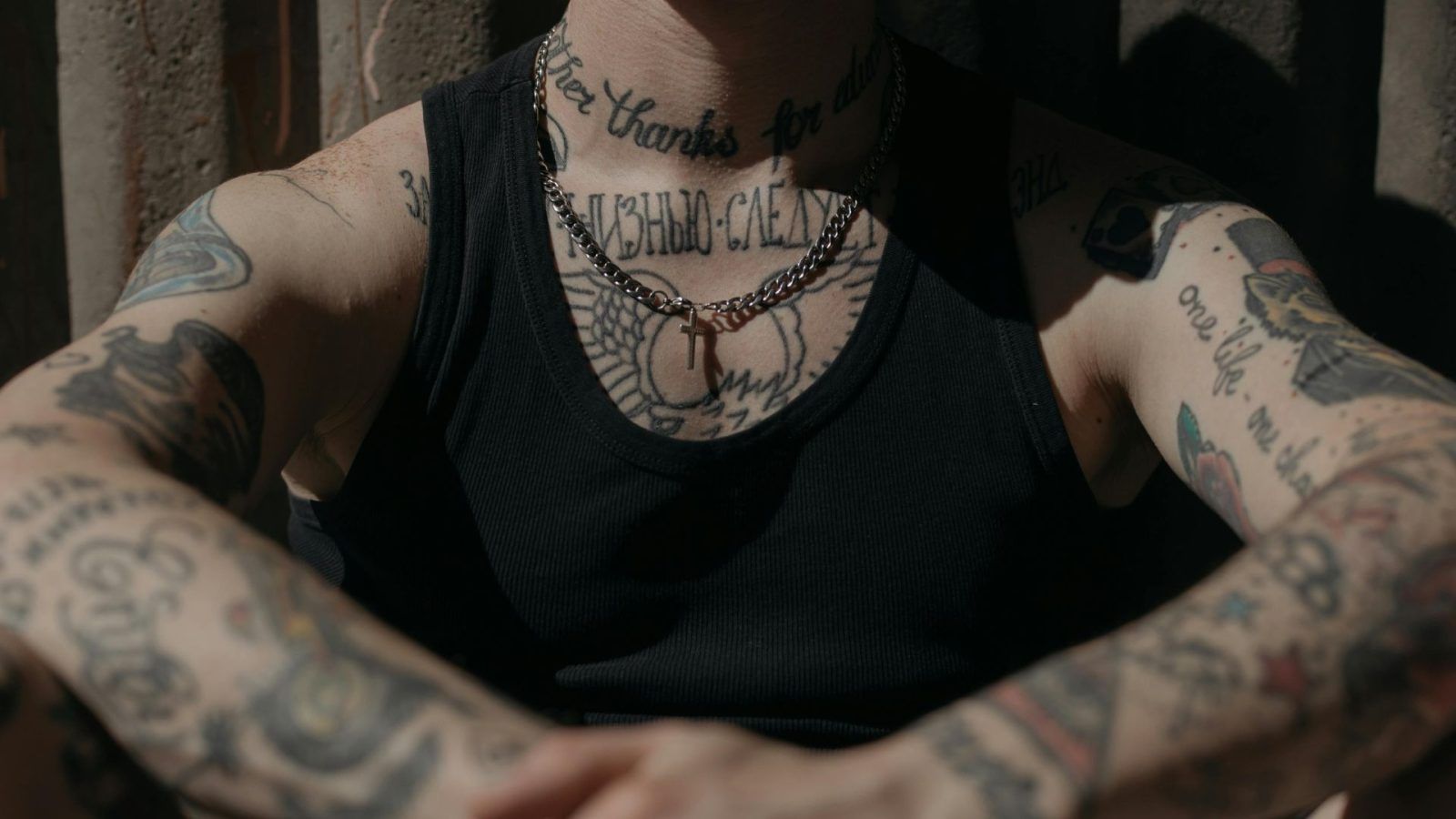 Person with Neck Tattoo Wearing Necklaces · Free Stock Photo