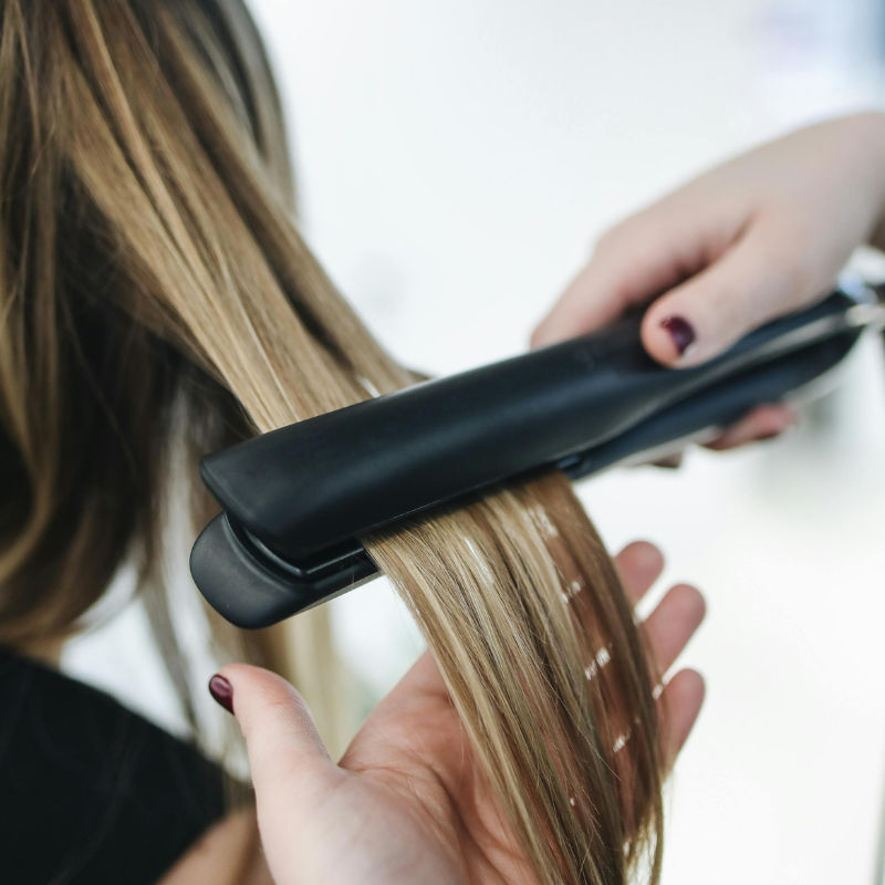 Here’s what hair experts say about silk pressing your hair