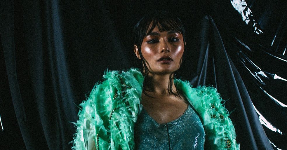 How do young designers want the Singapore fashion industry to change?