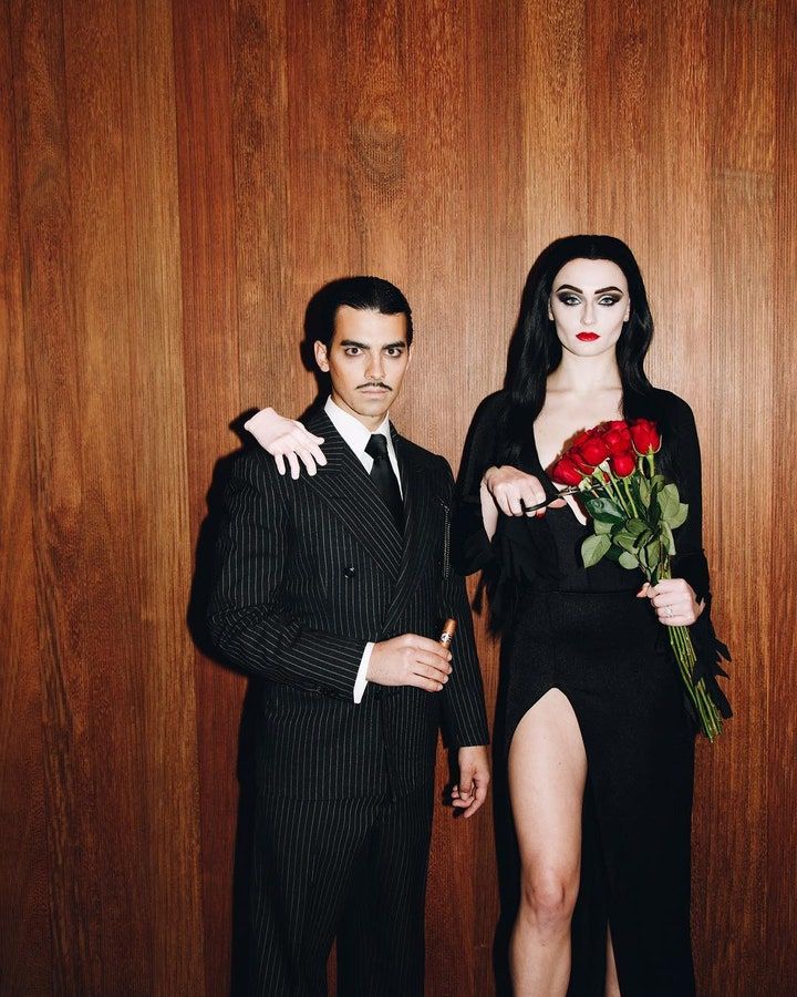 Sophie Turner and Joe Jonas as Morticia and Gomez Addams, as well as The Thing (Photo credit: Sophie Turner / Instagram)