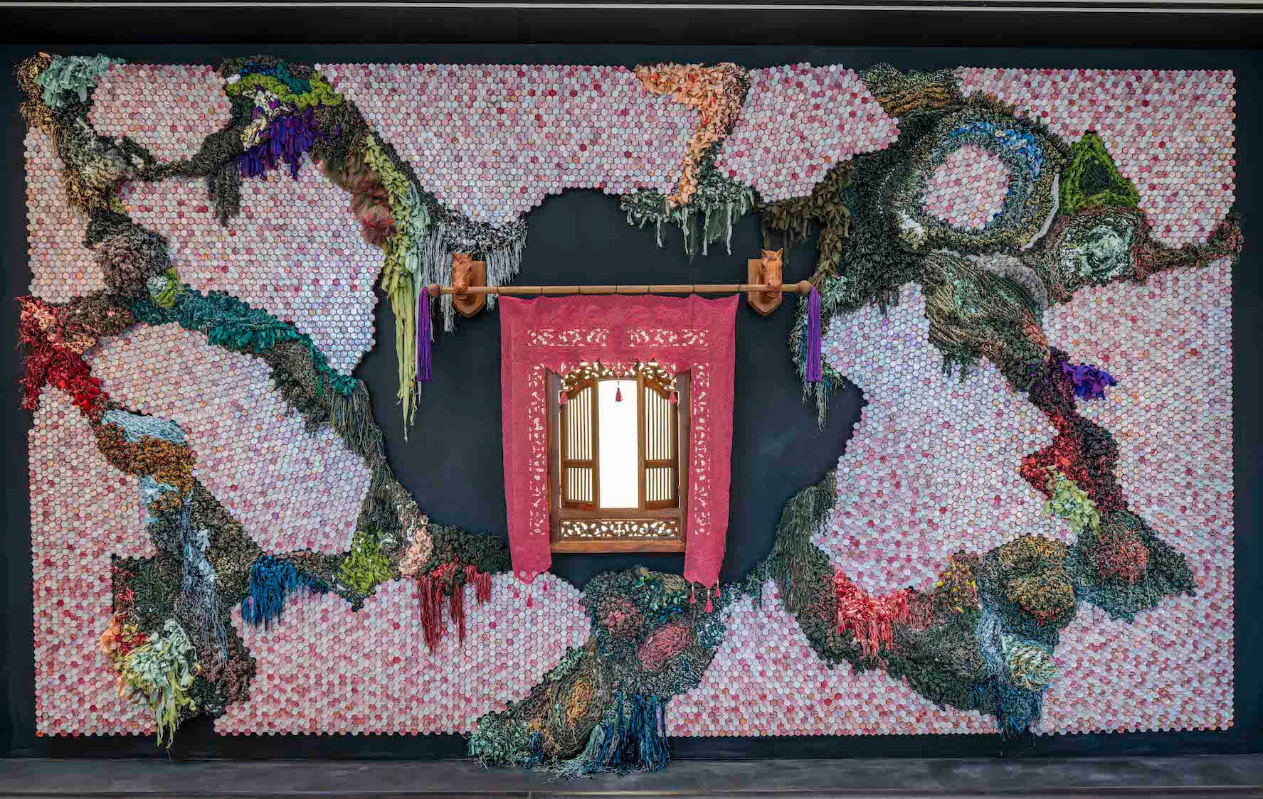 Art wall by Kelly Limerick, now on display at the Gucci MBS store (Photo credit: Gucci)