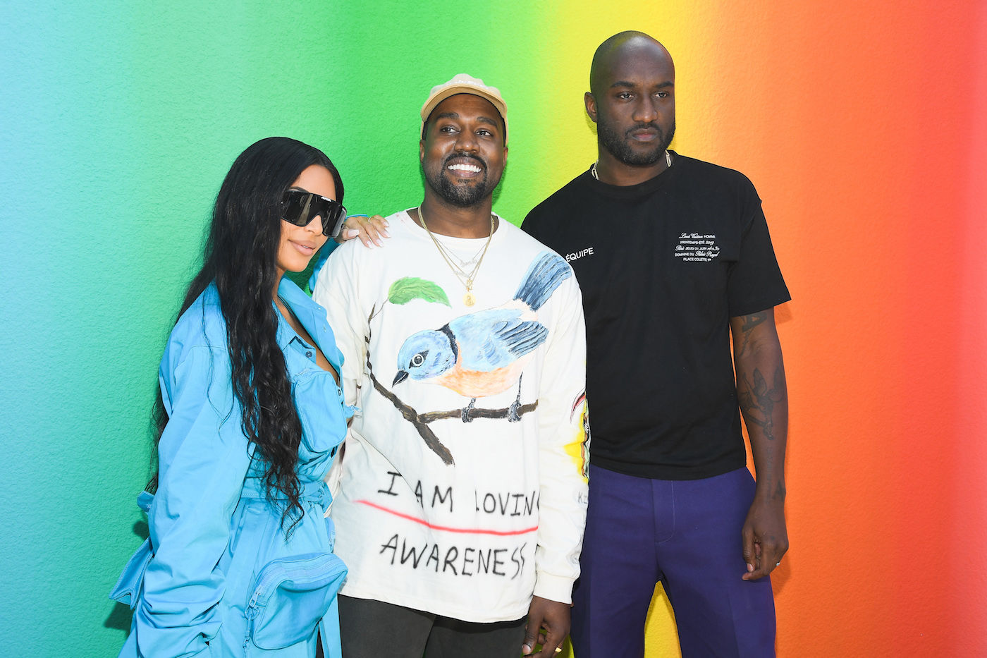 Kim Kardashian and Kanye West support Virgil Abloh at his first menswear show for Louis Vuitton.