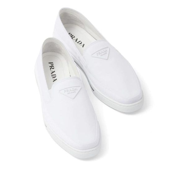 White slip on leather on sale sneakers