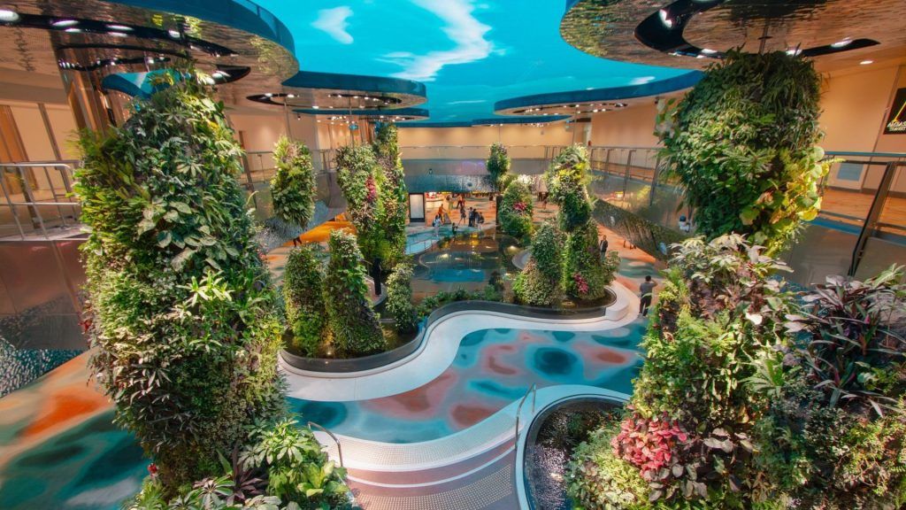 Changi Airport T2 reopens: Expect a 4-storey waterfall, robot bartender and more