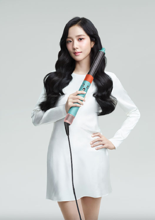 South Korean idol JISOO poses with a Dyson Airwrap Multi-Styler as the brand's latest ambassador.