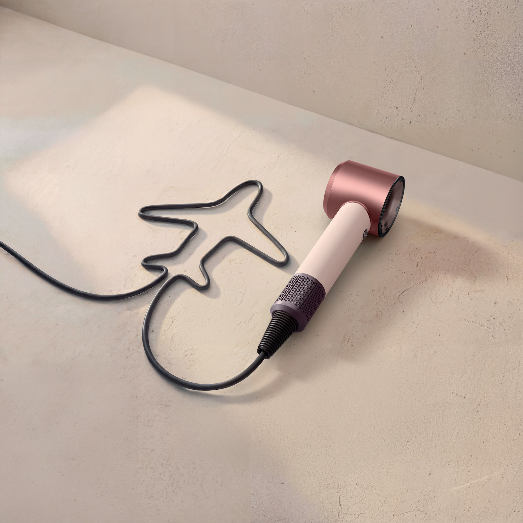 Dyson's new travel-sized Supersonic hairdryer can be used anywhere in the world