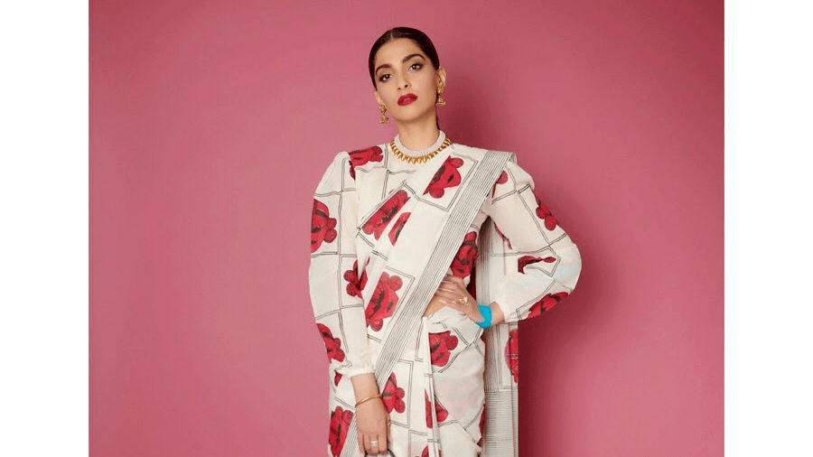 Graphic florals to tribal masks: Celeb-approved printed saris you’ll love