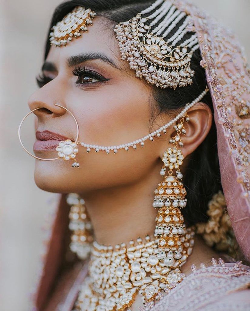 Bride with beautiful nose ring  Bridal jewellery indian, Indian bridal  photos, Bridal makeup