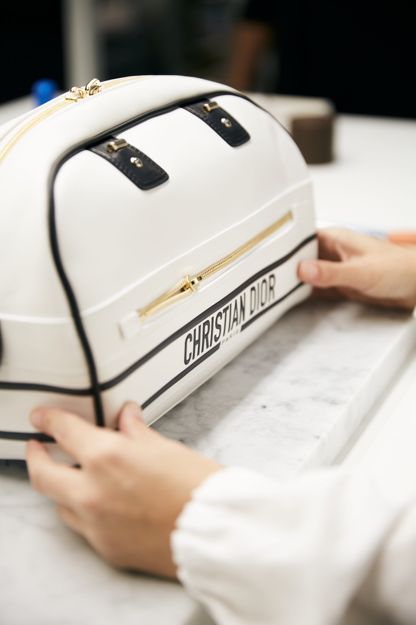 The must have Dior Vibe bowling bag launched at its Cruise 2022 show