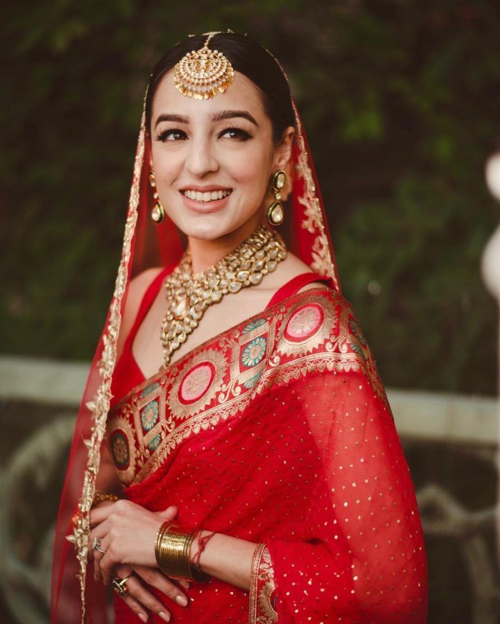 Brides who wore the traditional red wedding outfits in their own unique way