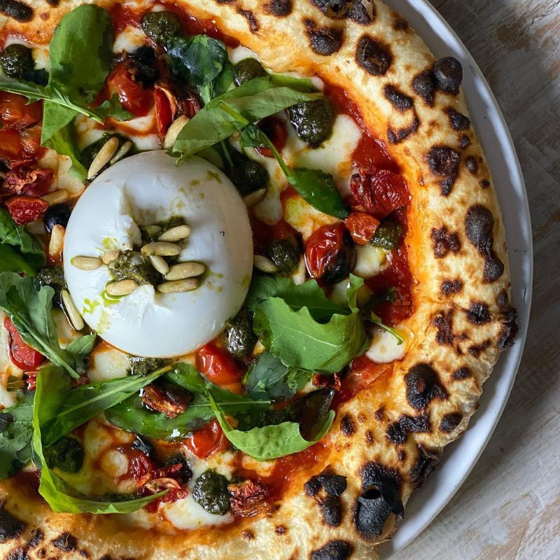 Order the creamiest burrata pizzas in Delhi from these Italian places