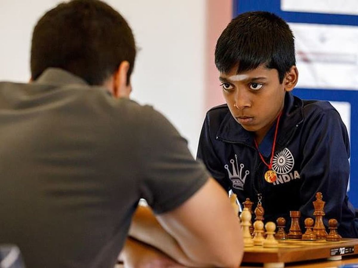 r praggnanandhaa: Teenage chess prodigy R Praggnanandhaa beats world chess  champion Magnus Carlsen thrice in a year - The Economic Times