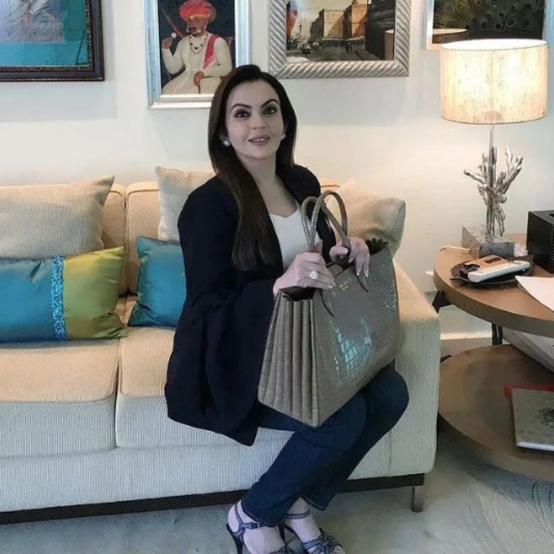 Nita Ambani Poses With A Young Fan At NMACC, Styles Her Simple Look With A  Dior Bag Worth Rs 2 Lakh