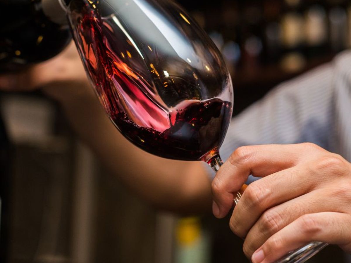 Why is it Important to Hold a Wine Glass by the Stem?
