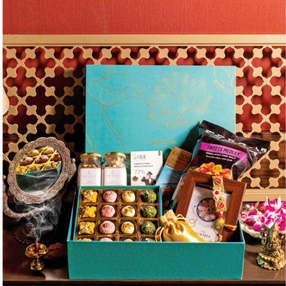Rakhi Gifts-Ghasitaram Big Hamper Box of assorted Goodies 23 goodies w –  Ghasitaram Gifts