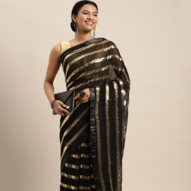 deepika padukone: Put on your shades! Deepika Padukone in black-and-gold  Sabyasachi saree brings a blinding blaze of bling to Cannes - The Economic  Times