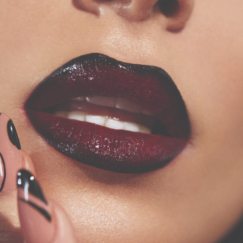 Try vampire lips for a minimalistic Halloween makeup look