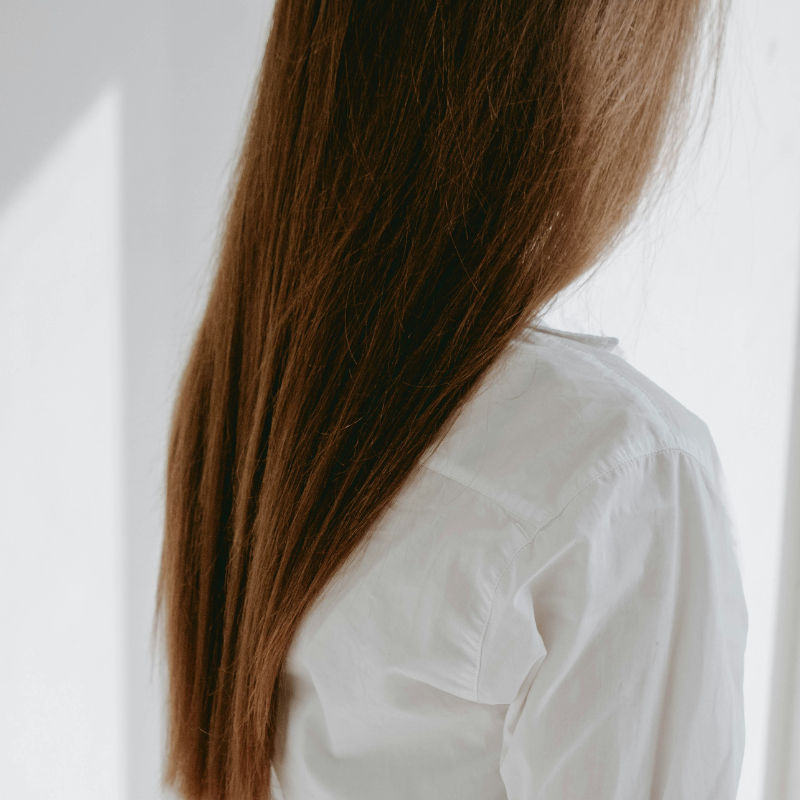 Achieve shiny and frizz-free hair: The ultimate guide to hair smoothening at home